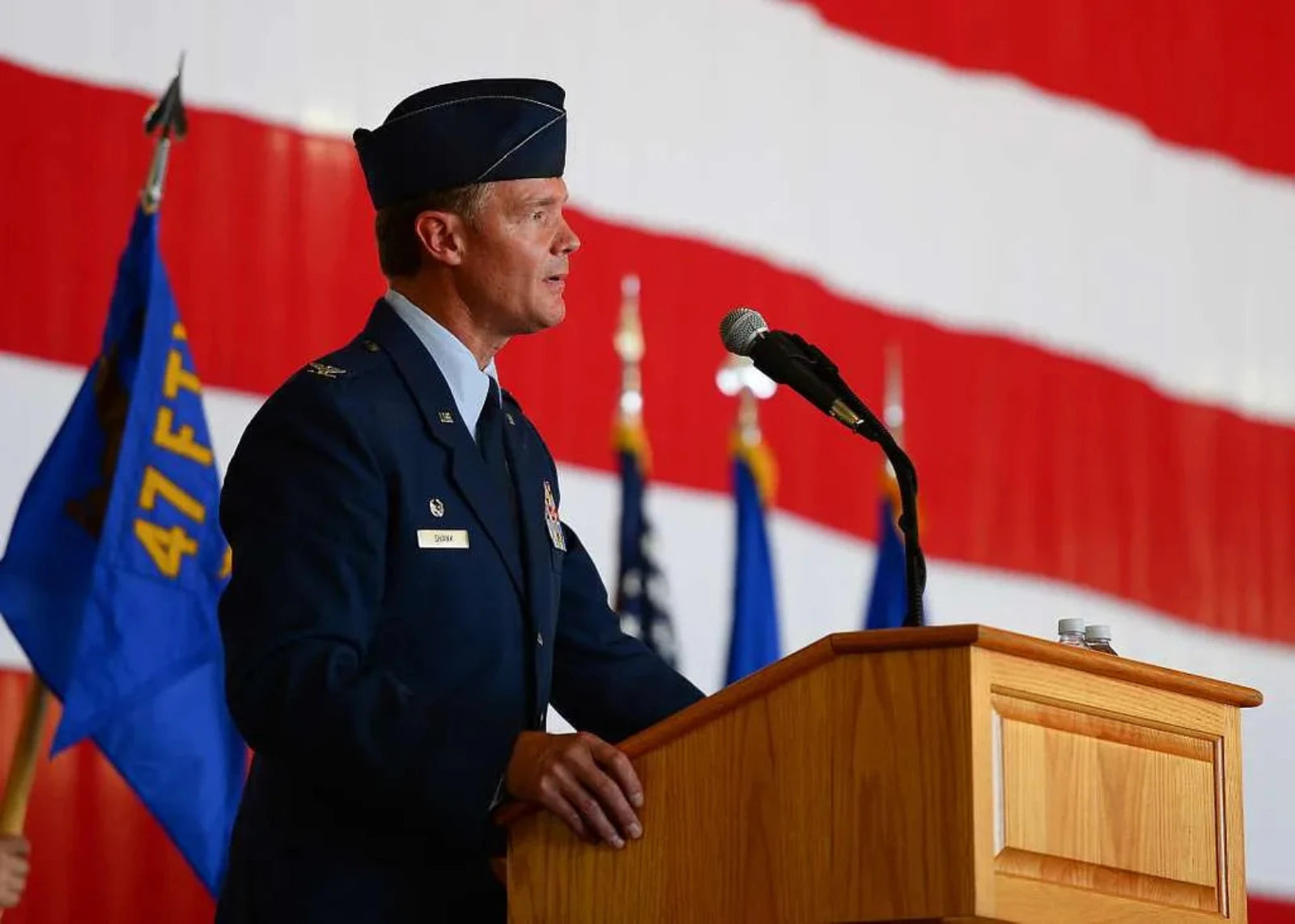 COLONEL THOMAS SHANK (RET.) of United States Air Force speaking.